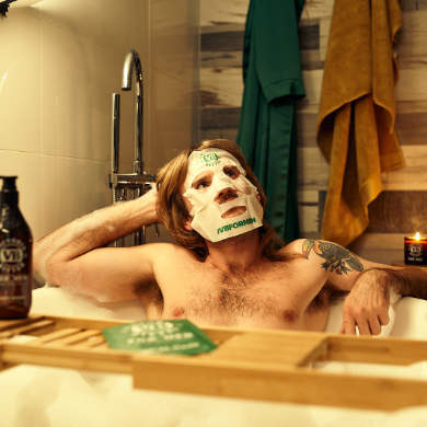 Man wearing face mask in the bath